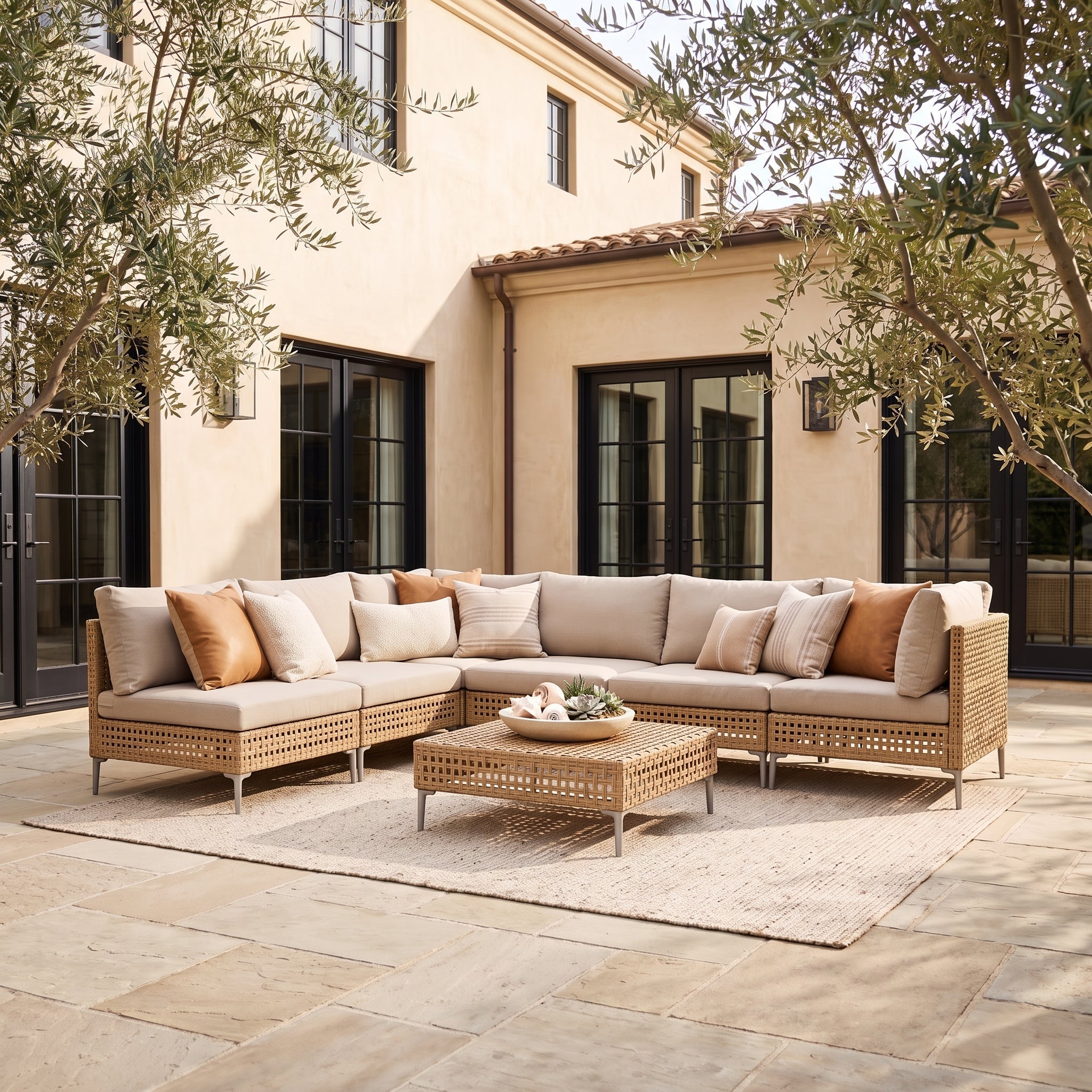 Six-seat wicker sectional arranged on an outdoor patio